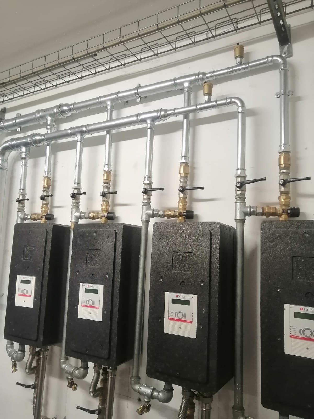 Impianti di riscaldamento per complesso natatorio — Flero (BS) (foto 1)